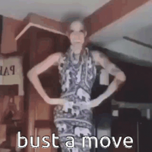 Woman in Dress Hands on Hips Says Bust a Move