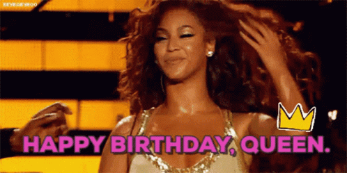 Woman In Dress Holding Hair Saying Happy Birthday Queen GIF