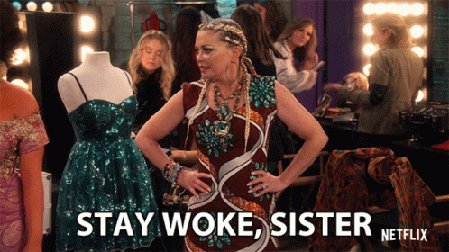 Woman in Dress Saying Stay Woke Sister