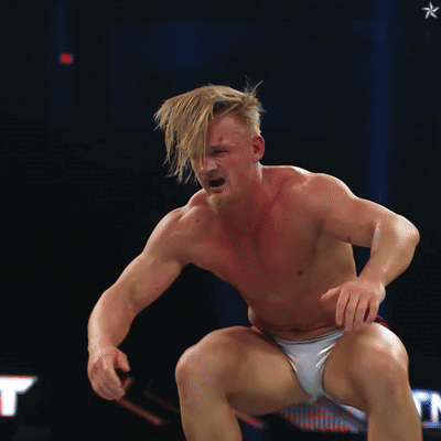 Woman in Dress Wrestling With Referee