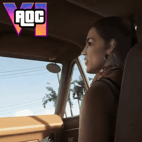 Woman in Driver Seat With AOC Logo