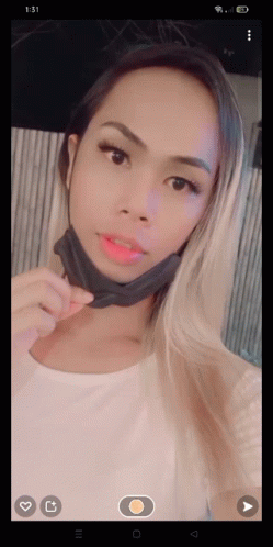 Woman In Face Mask Taking Selfie GIF