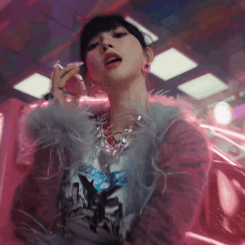 Woman in Feathered Jacket and Necklace Smoking Cigarette