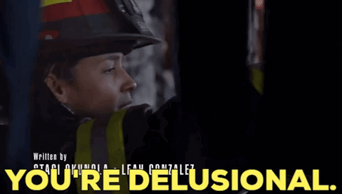 Woman in Fireman Helmet Says You're Delusional