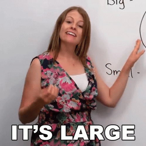 Woman in Floral Dress Saying Large