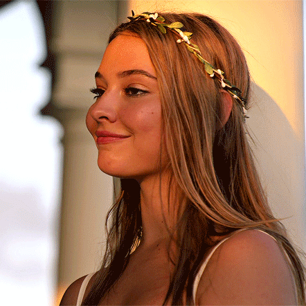 Woman in Floral Headband Smiling