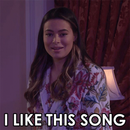 Woman in Floral Robe Saying I Like This Song