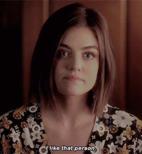 Woman In Floral Shirt Saying I Like That Person GIF