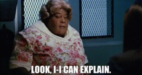 Woman In Floral Shirt Saying Look I Can Explain GIF