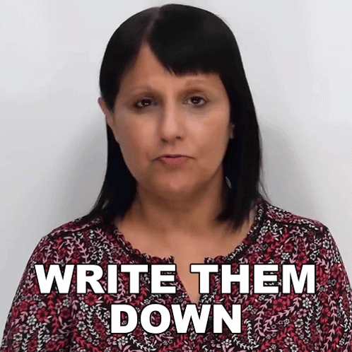 Woman in Floral Shirt Saying Write Them Down