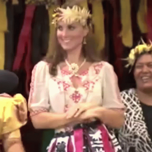 Woman In Flower Crown Smiling Next To Women GIF