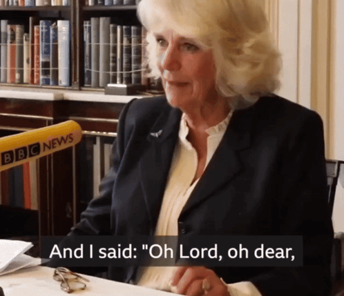 Woman in Front of BBC News Microphone