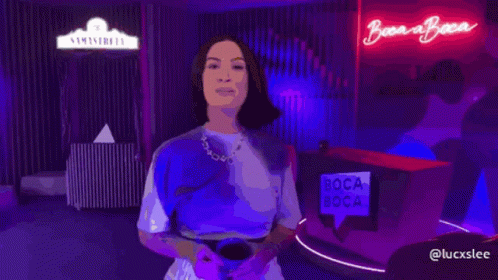 Woman in Front of Boca Boca Sign