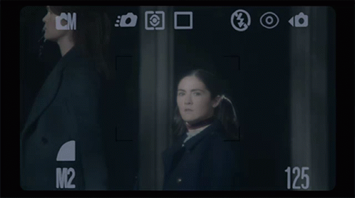 Woman In Front Of Camera Saying 125