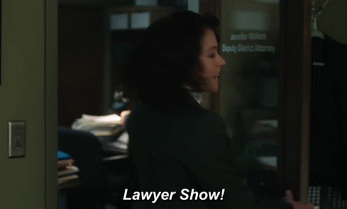 Woman in Front of Deputy District Attorney Window