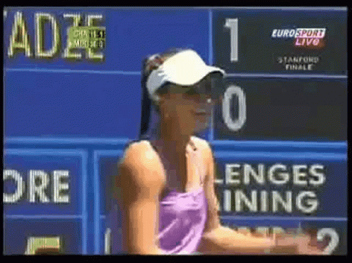 Woman in Front of Eurosport Live Scoreboard