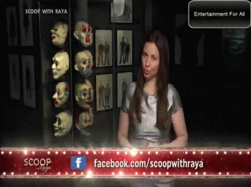 Woman in Front of Facebook Banner