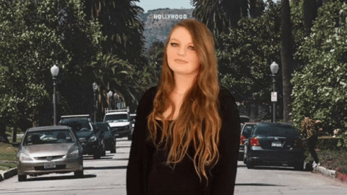 Woman In Front Of Hollywood Sign GIF