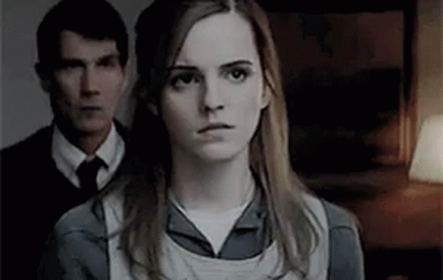 Woman in Front of Man in Suit and Tie