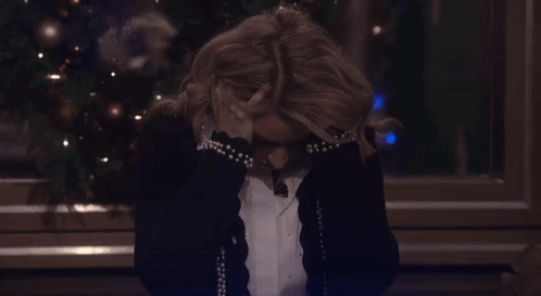Woman In Front Of Screen Saying 4 GIF