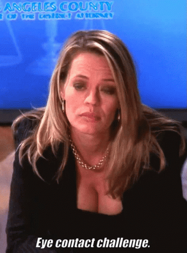 Woman In Front Of Screen Saying Angeles County GIF