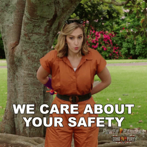 Woman in Front of Tree With We Care About Your Safety