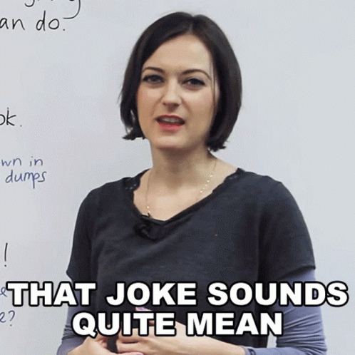 Woman in Front of White Board Says That Joke Sounds Quite Mean