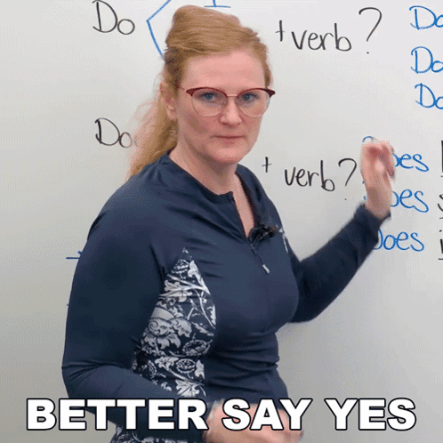 Woman in Front of Whiteboard Saying Better Say Yes