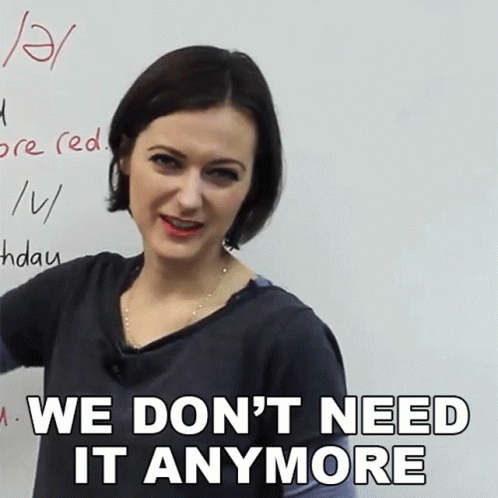 Woman in Front of Whiteboard Saying We Don't Need It Anymore