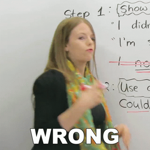 Woman in Front of Whiteboard with Wrong