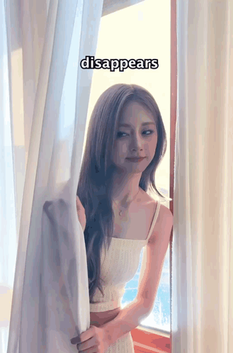 Woman in Front of Window with Word Disappears