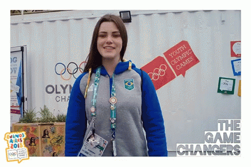 Woman in Front of Youth Olympic Games Building
