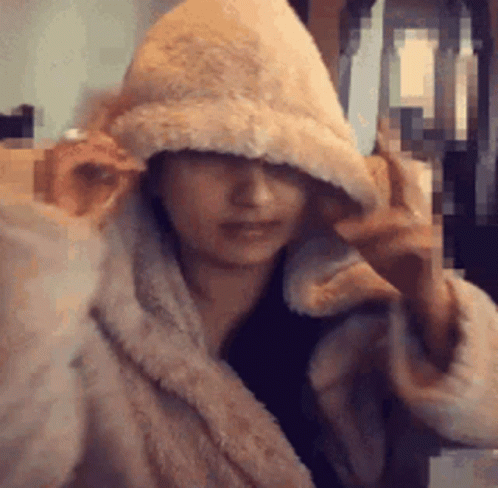 Woman In Fur Coat And Hooded Hat GIF