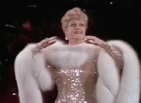 Woman in Fur Coat and Sequin Dress