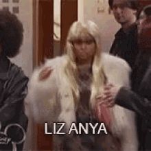 Woman In Fur Coat Says Liz Anya GIF