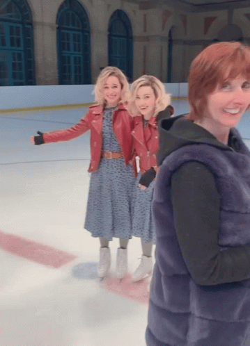 Woman in Fur Vest with Two Women on Ice