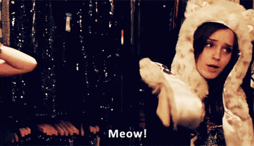 Woman in Furry Hat Meows