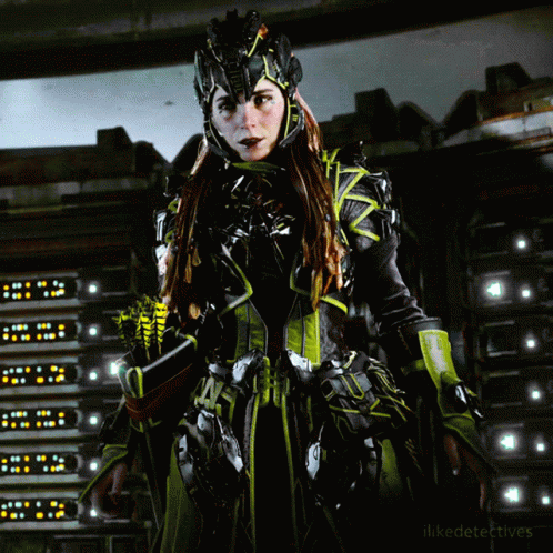 Woman in Futuristic Costume in Front of Servers ilikedetectives