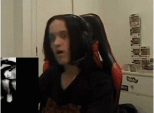 Woman In Gaming Chair Making Funny Face GIF