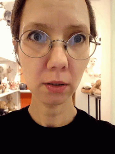 Woman in Glasses and Black Shirt