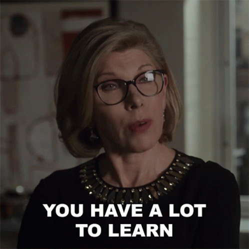 Woman in Glasses and Black Top Says You Have a Lot to Learn