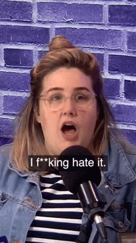 Woman in Glasses and Denim Jacket Saying I F***ing Hate It