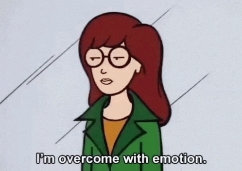 Woman In Glasses And Green Jacket Saying I'm Overcome With Emotion GIF