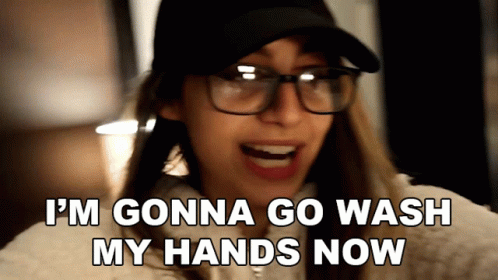Woman In Glasses And Hat Saying I'm Gonna Go Wash My Hands Now GIF