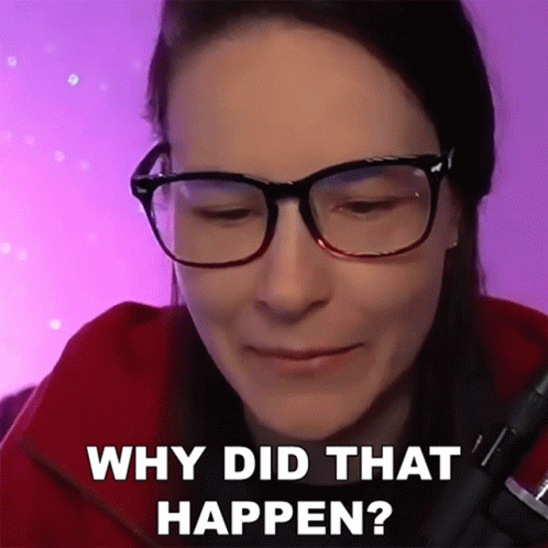Woman in Glasses and Red Jacket Asking Why