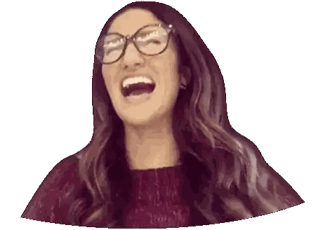 Woman in Glasses and Sweater Laughing