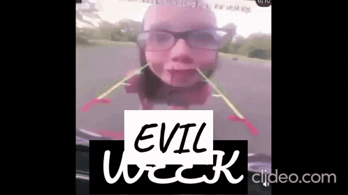 Woman in Glasses Driving Car With Evil Wreck Sign