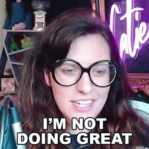 Woman in Glasses Saying I'm Not Doing Great