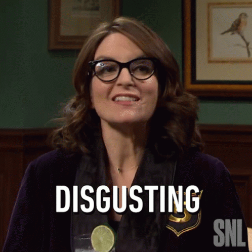 Woman in Glasses Says Disgusting in Front of Picture