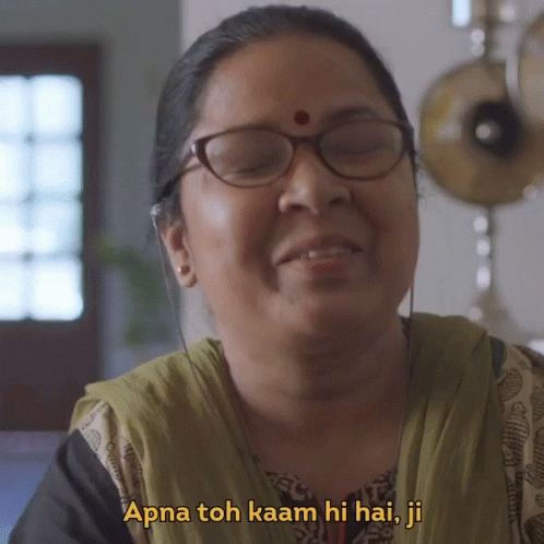 Woman in Glasses Smiling Says Apna Toh Kaan Hi Hai Ji